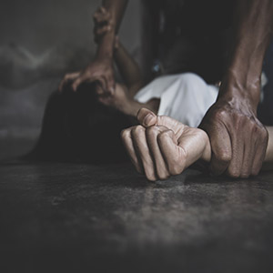 Silhouette of a person in a corner, illustrating the serious nature and stigma of sex crime allegations.
