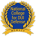 National College for DUI Defense gold laurel wreath emblem with blue center.