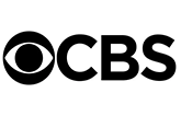 CBS News logo featuring the famous "eye" symbol and bold black uppercase letters.
